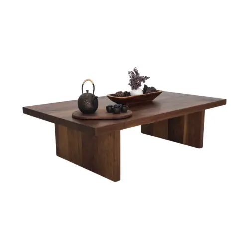 LILY coffee table in solid walnut with a 2 inch thick slab style top and panel legs