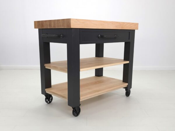 An image of a butcher block kitchen island on wheels.