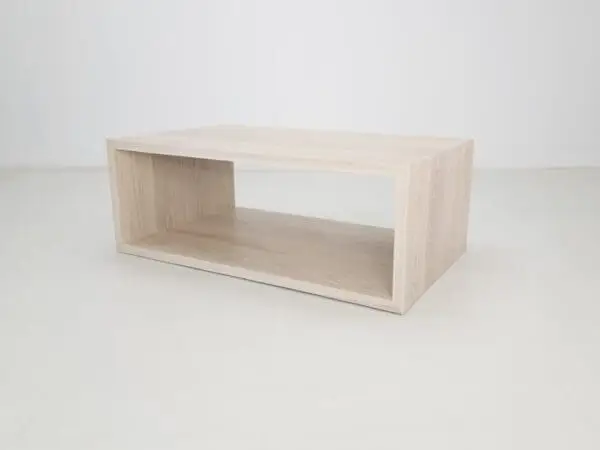 A rectangular coffee table with an open design.