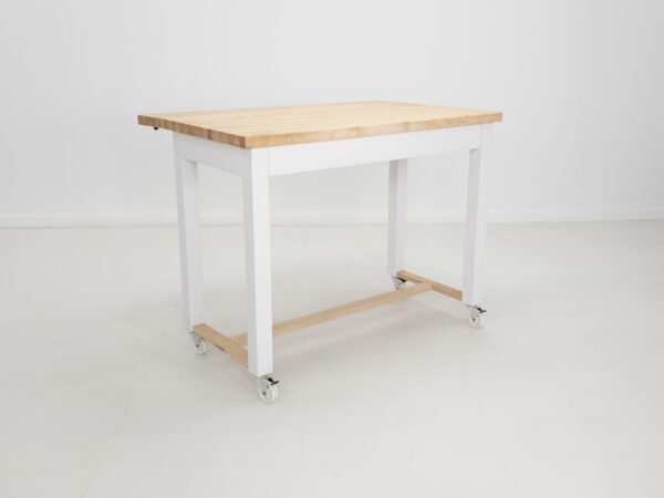 A butcher block kitchen island with room for seating and a drop leaf extension.