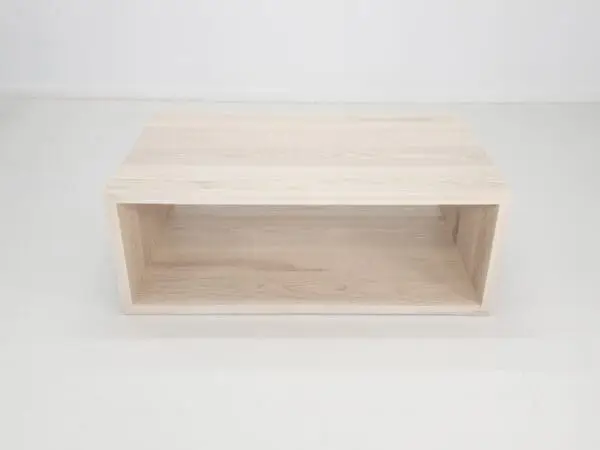 A rectangular coffee table with an open design.