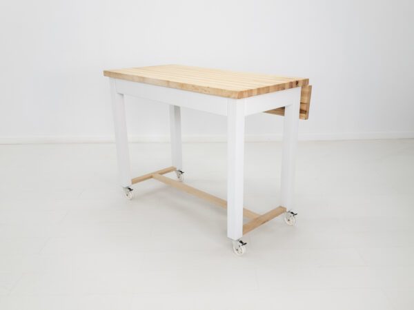 A butcher block kitchen island cart with room for seating and a drop leaf extension.