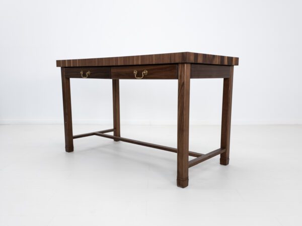 A walnut kitchen island with seating room.