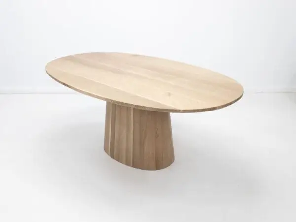 Our CATE dining table with a pedestal base.