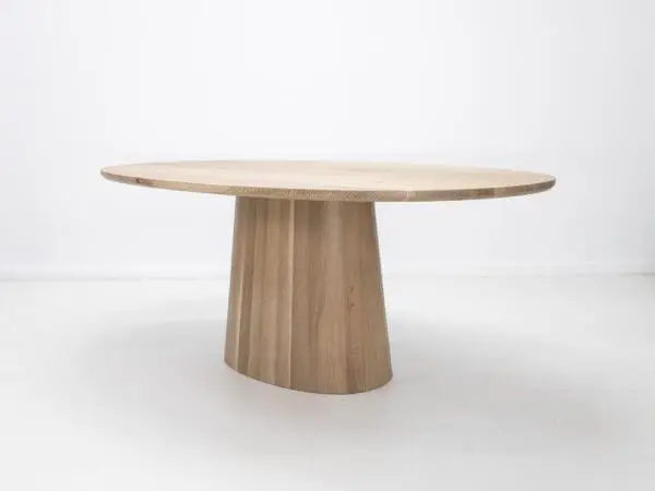 Our CATE dining table with a pedestal base.