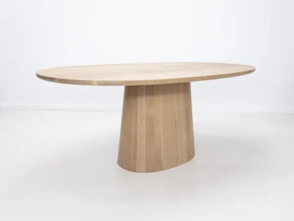 Our CATE dining table with a pedestal base.