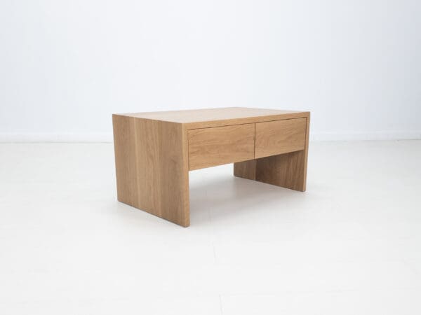 A coffee table with drawers.