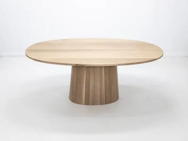 Our CATE dining table with a pedestal base.