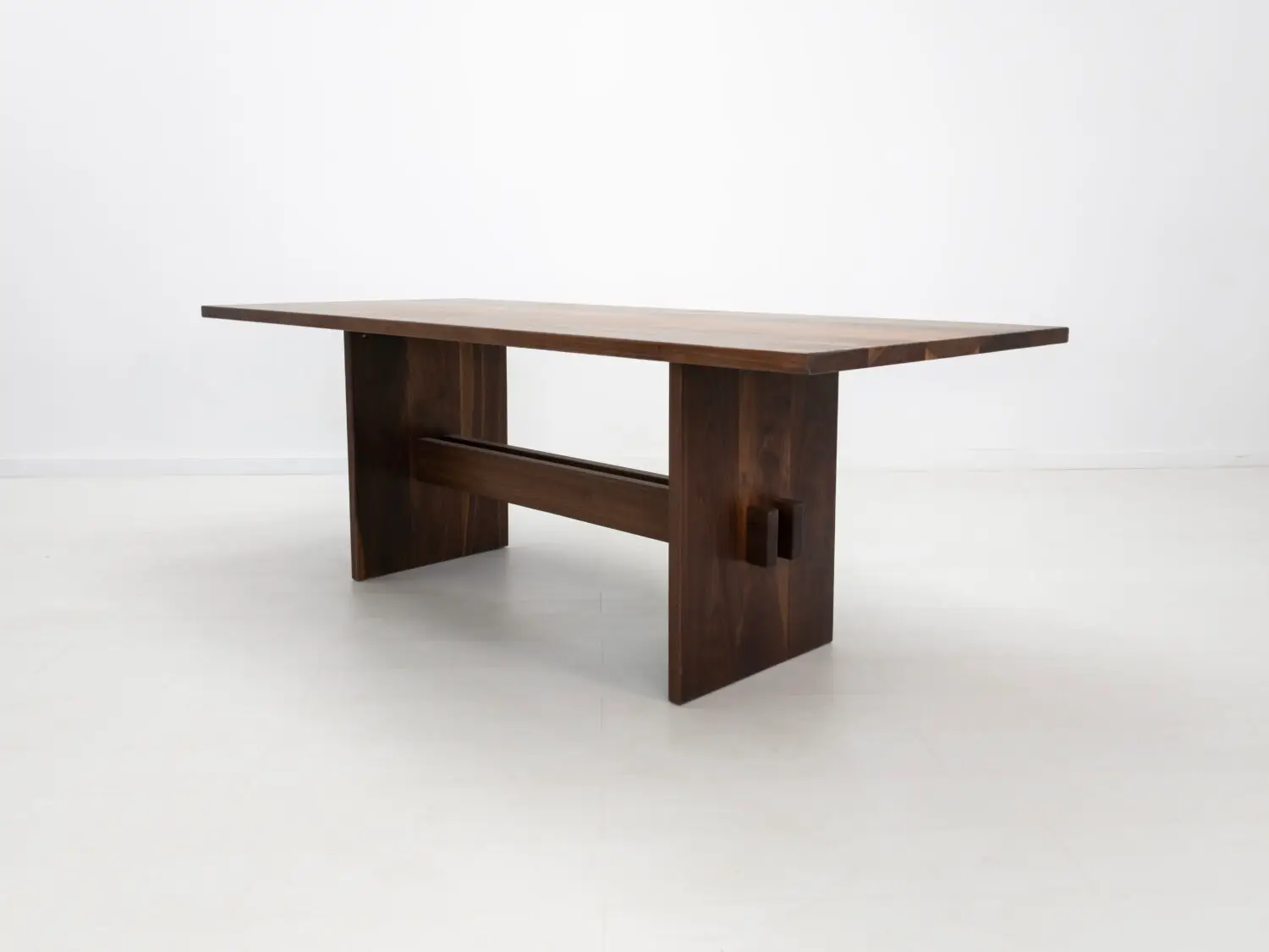 Duke dining table in walnut available in custom sizes and finishes