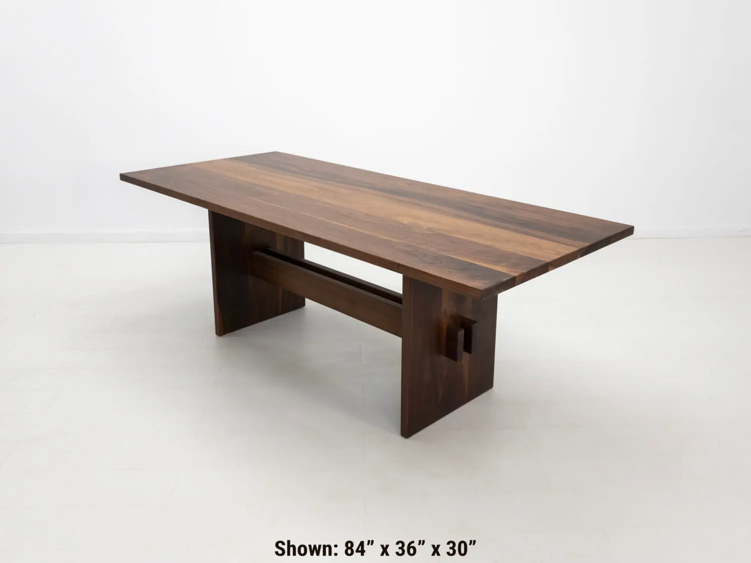 Duke dining table in walnut available in custom sizes and finishes