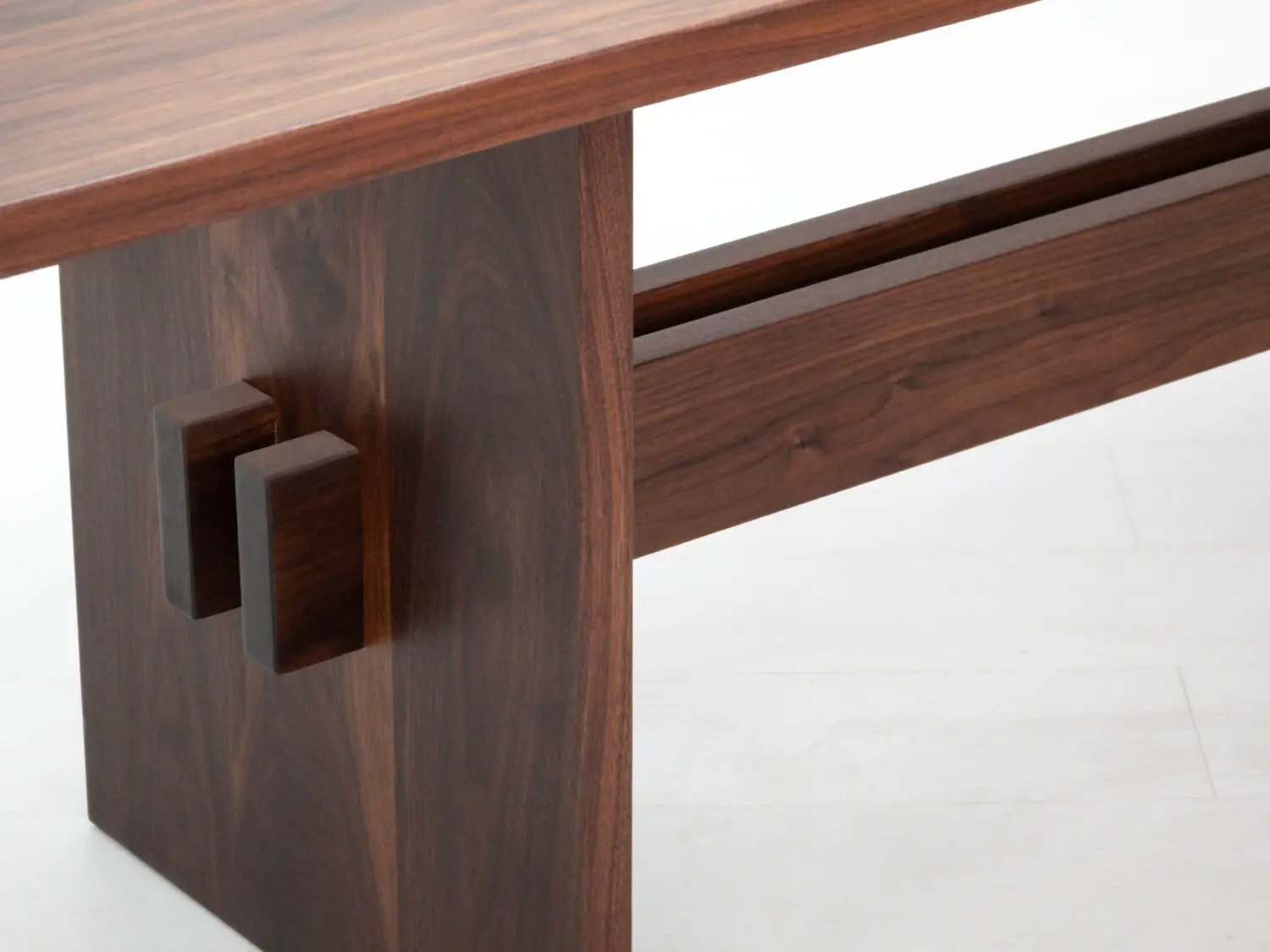 Close up of solid wood grain on Duke dining table