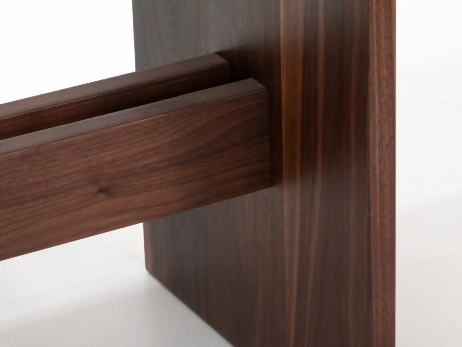 Close up of solid wood grain on Duke dining table