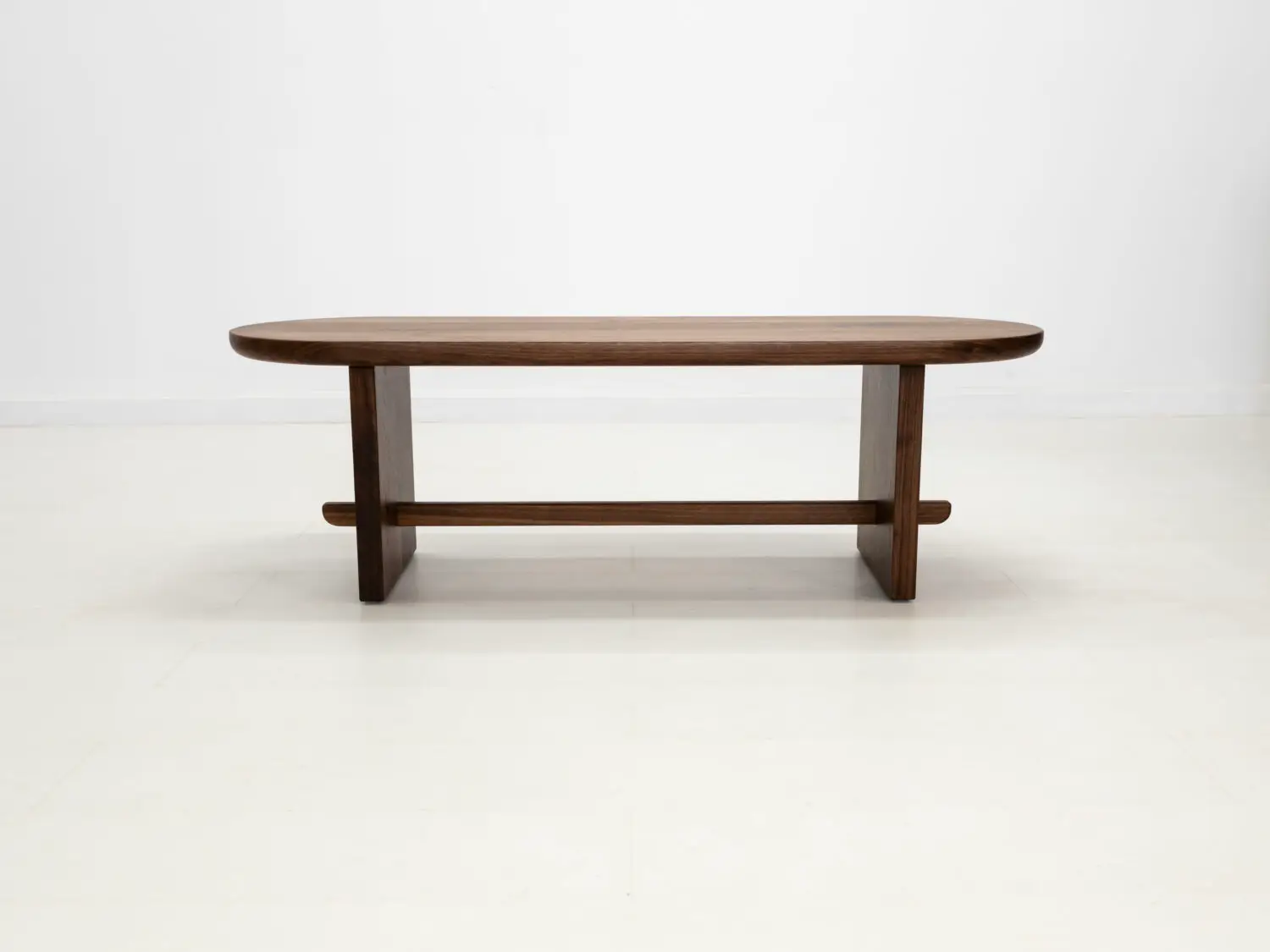 MIRA coffee table in solid American hardwood with a 1½ inch thick capsule shaped top