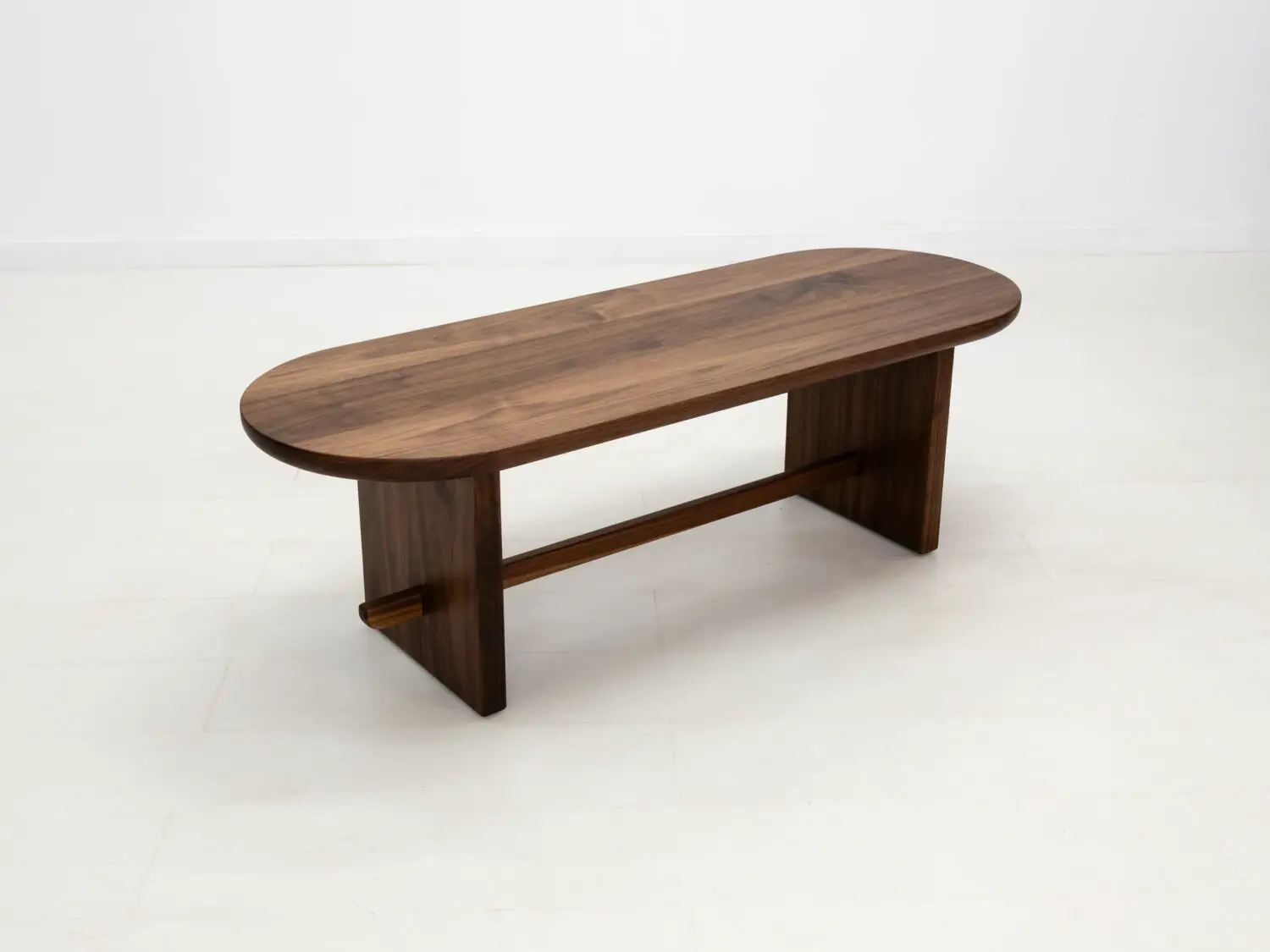 MIRA coffee table in solid American hardwood with a 1½ inch thick capsule shaped top