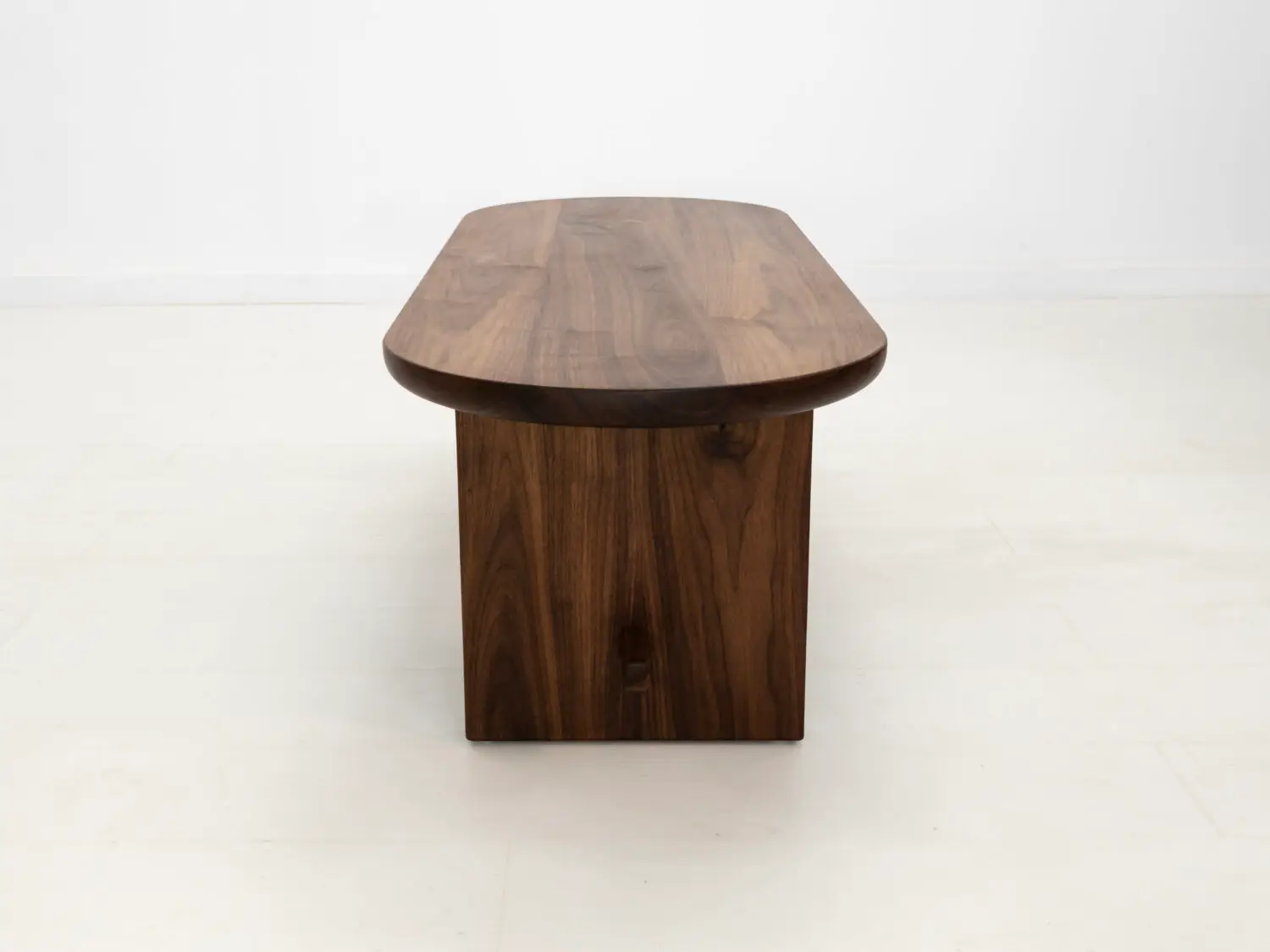 MIRA coffee table in solid American hardwood with a 1½ inch thick capsule shaped top