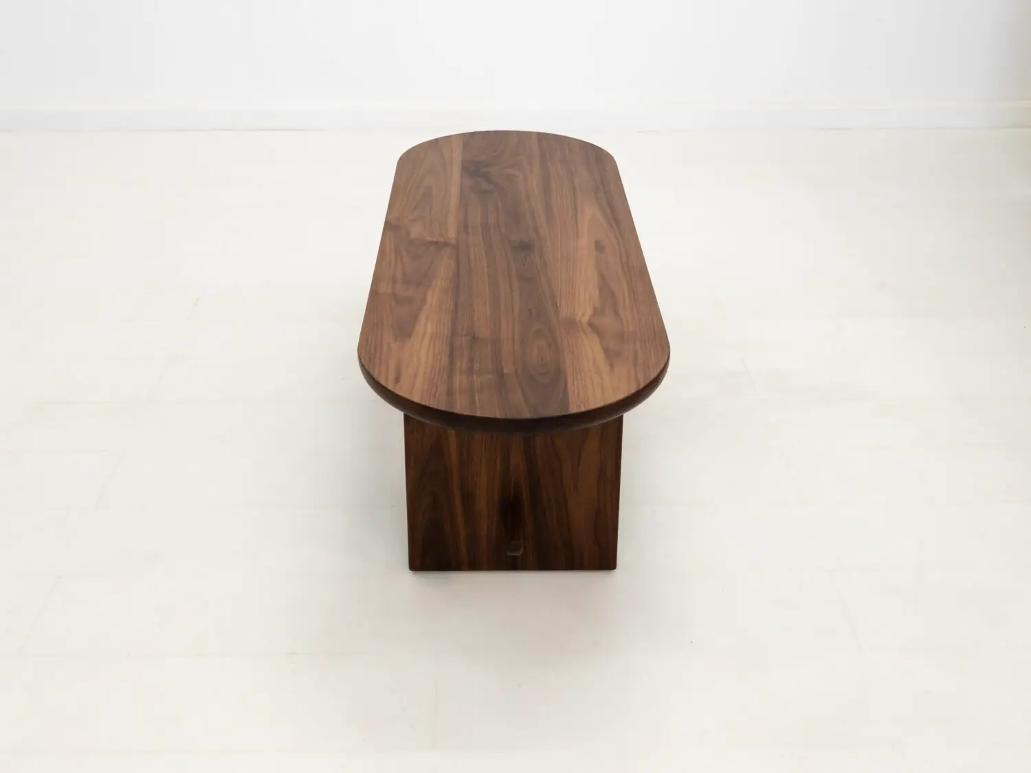 MIRA coffee table in solid American hardwood with a 1½ inch thick capsule shaped top