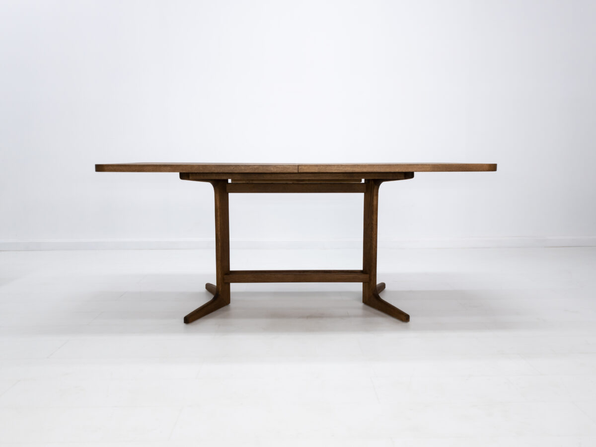 Handcrafted BRIA dining table shown in white oak with a custom stain finish