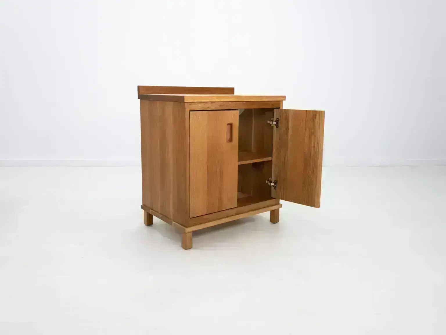 A rift sawn white oak vanity with 2 doors and ample storage