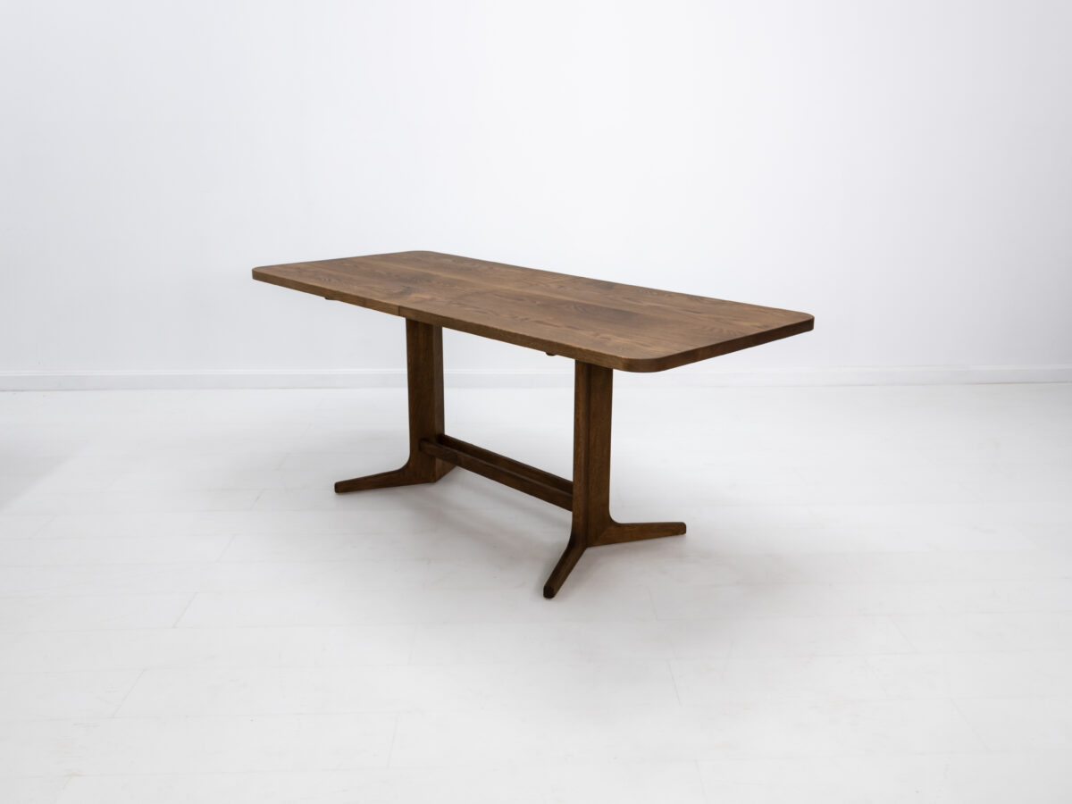 Handcrafted BRIA dining table shown in white oak with a custom stain finish
