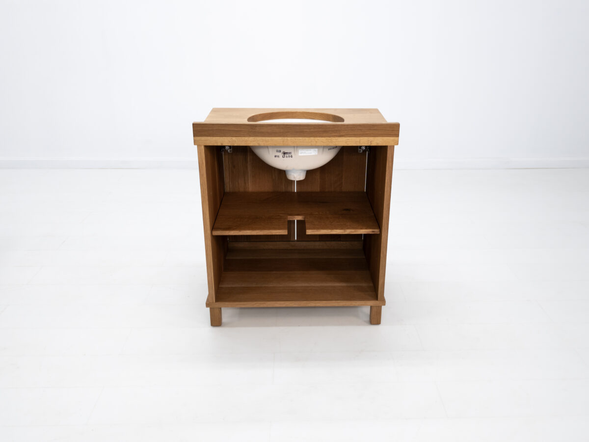 Custom rift sawn white oak vanity with solid wood top and soft close hardware