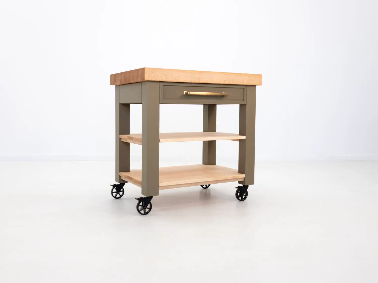 Side view of the CHEF kitchen cart with a spacious utensil drawer and flat black Top Knobs Ascendra pull