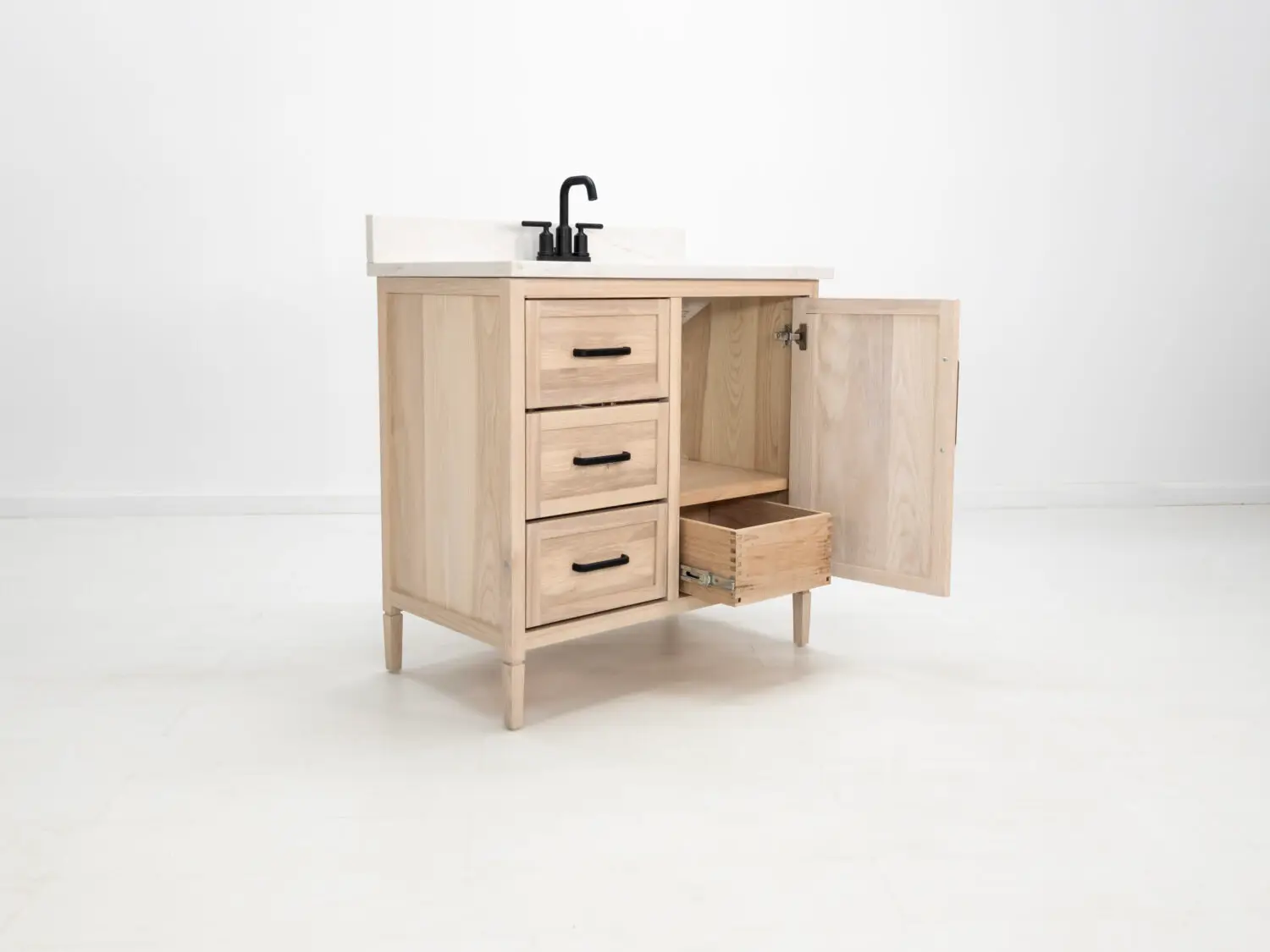Vanity with soft close drawers and cabinet shown without quartz top and sink