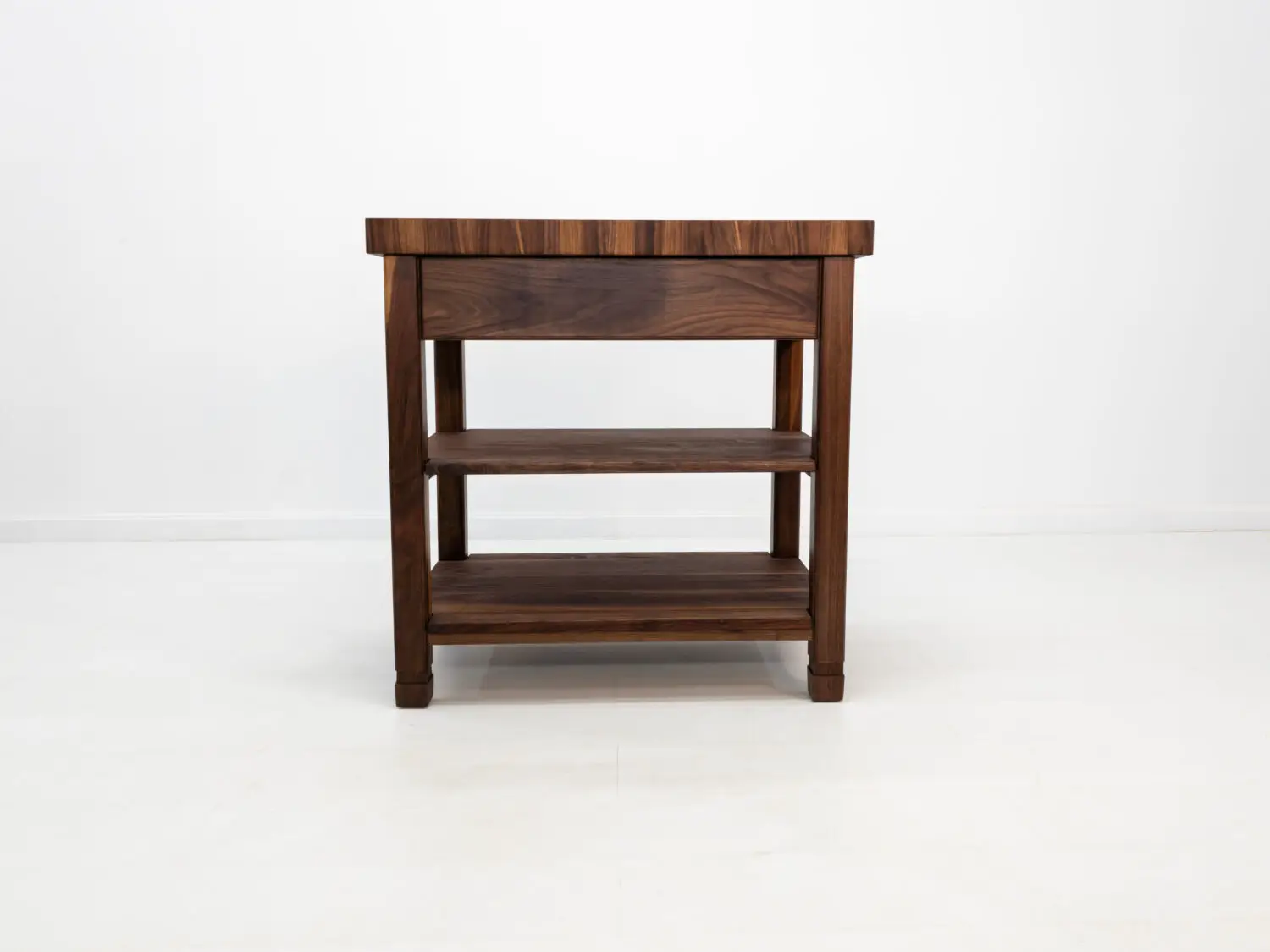 Back view of the WALT butcher block kitchen island in walnut