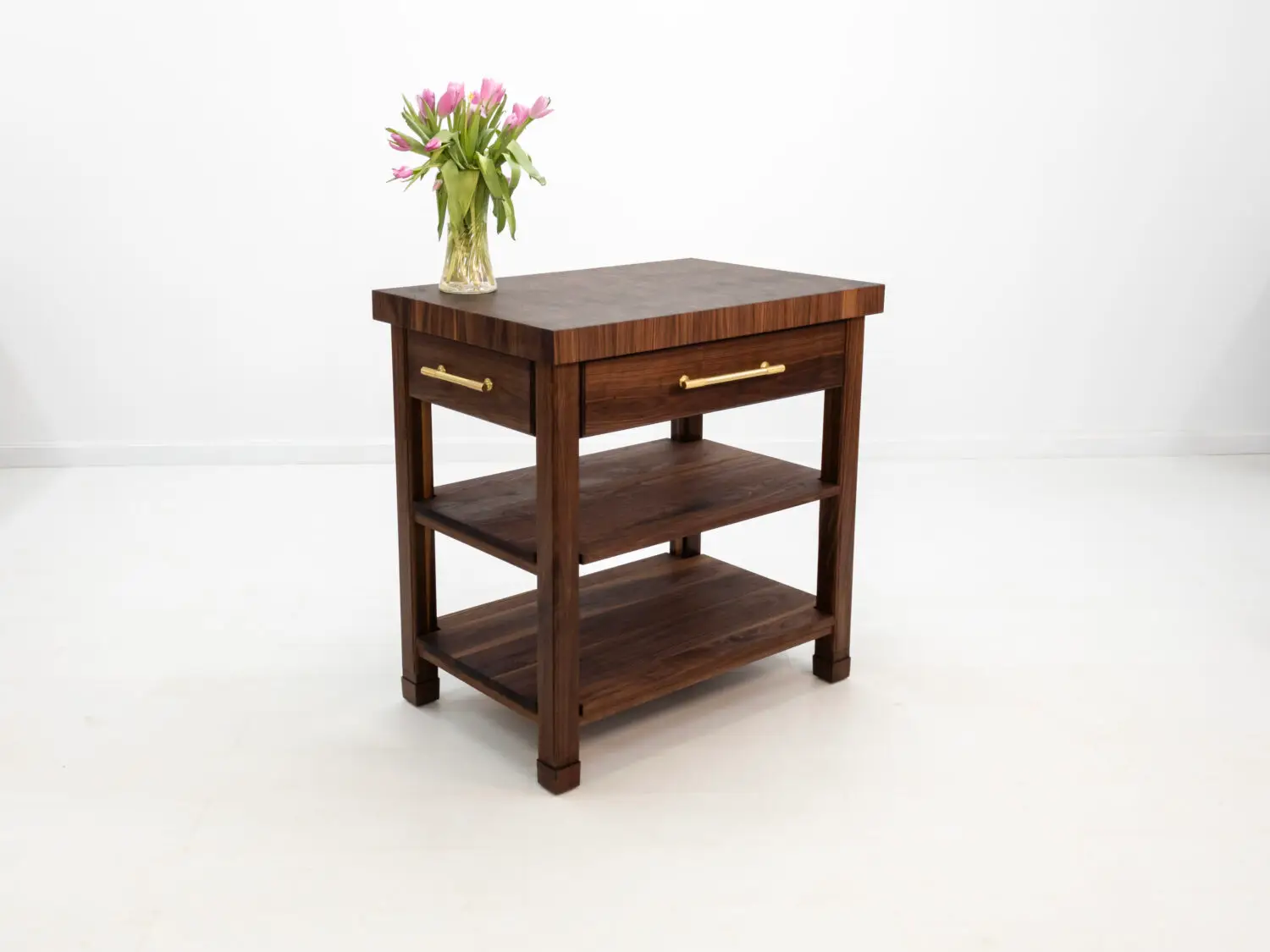 Front view of the WALT butcher block kitchen island in walnut
